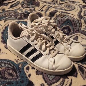 White Sneakers with Black Stripes